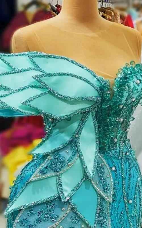 Azure Leaf Sculptural Mermaid Gown With Iridescent Beading And Tiered Petal Bodice